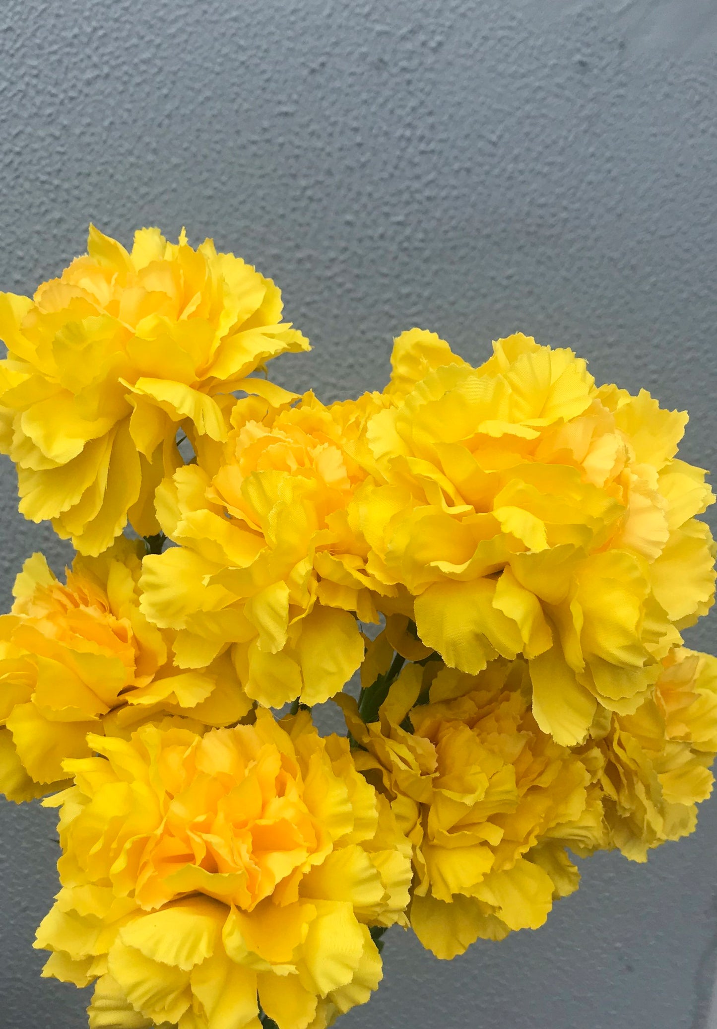 Faux yellow carnation