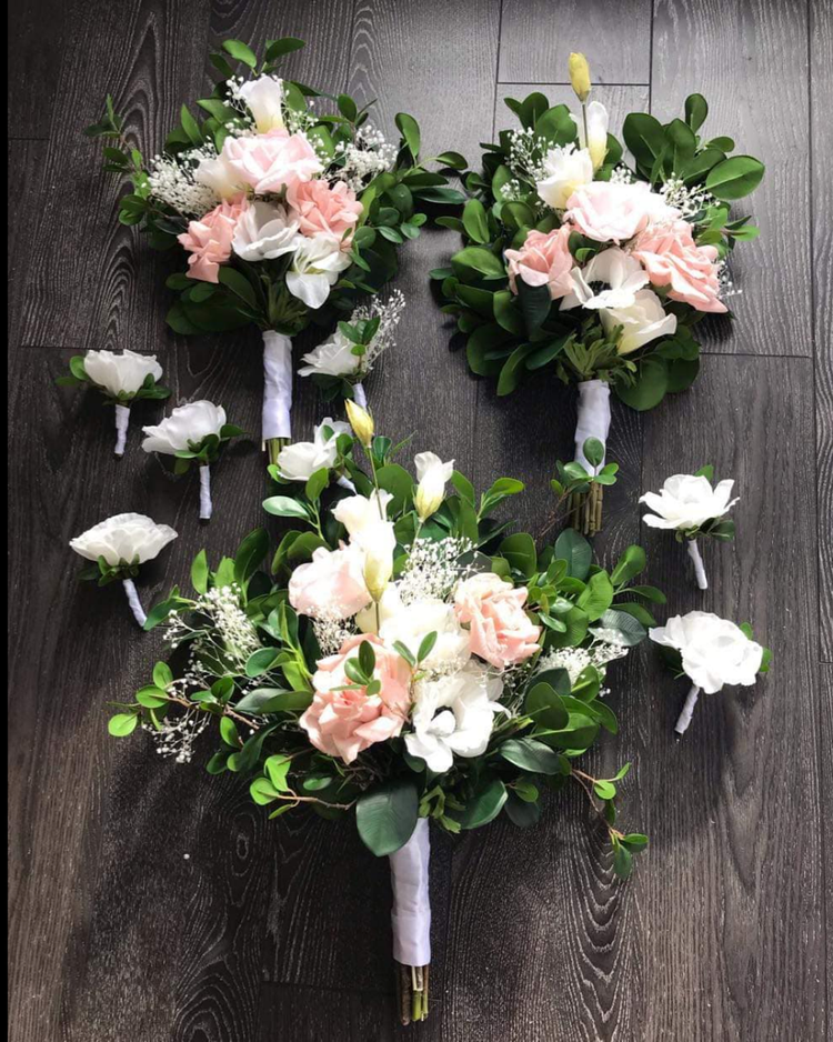 Dark green foliage with white real touch roses, anemone and boutonniere's, wedding flowers delivery, wedding flowers gold coast